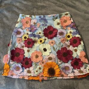 Floral appliqué skirt.